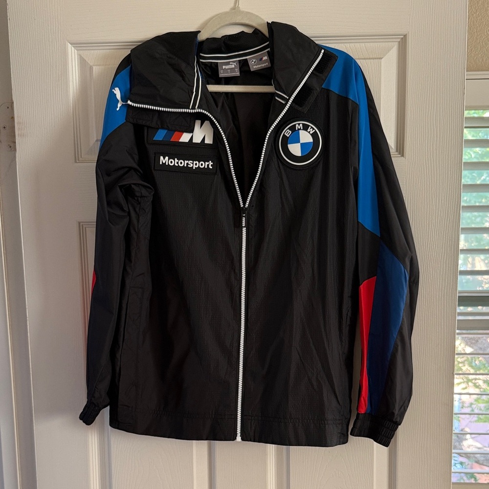 Puma Men's Black Windbreaker with Blue and Red Accents